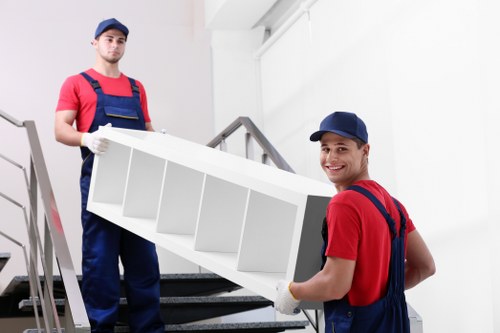 Charity donation of reusable furniture during a clearance
