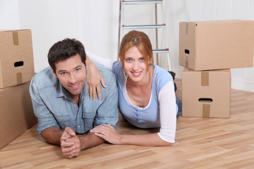 Moving boxes and household items loaded into a van