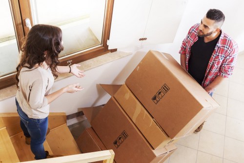 Loading boxes and furniture into a removals van for a Brockley move