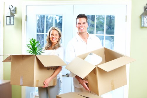 Boxes and furniture arranged after a successful Brockley house move