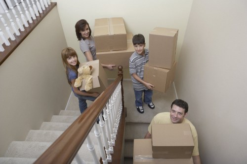 Movers handling furniture during a local relocation
